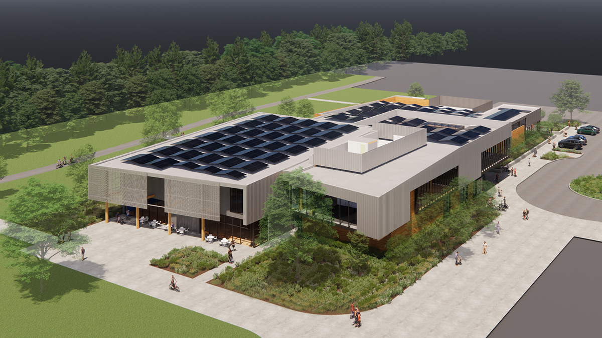 A rendering shows the community invested solar panels located on the top of the community center.